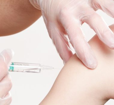 Canva - Hands Applying Vaccine