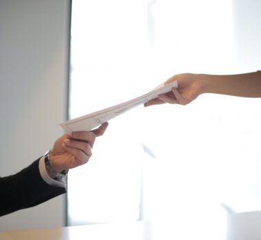 Canva - Job Applicant Passing Her Documents
